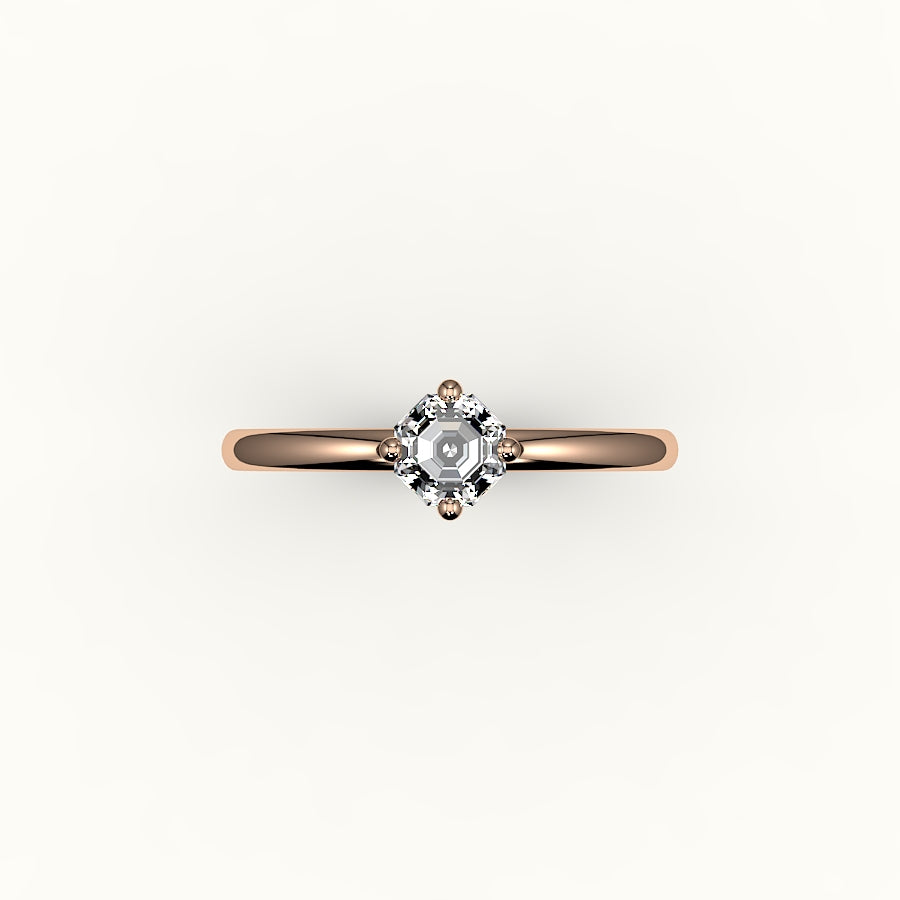 Anillo solitario con corte octogonal y brújula
