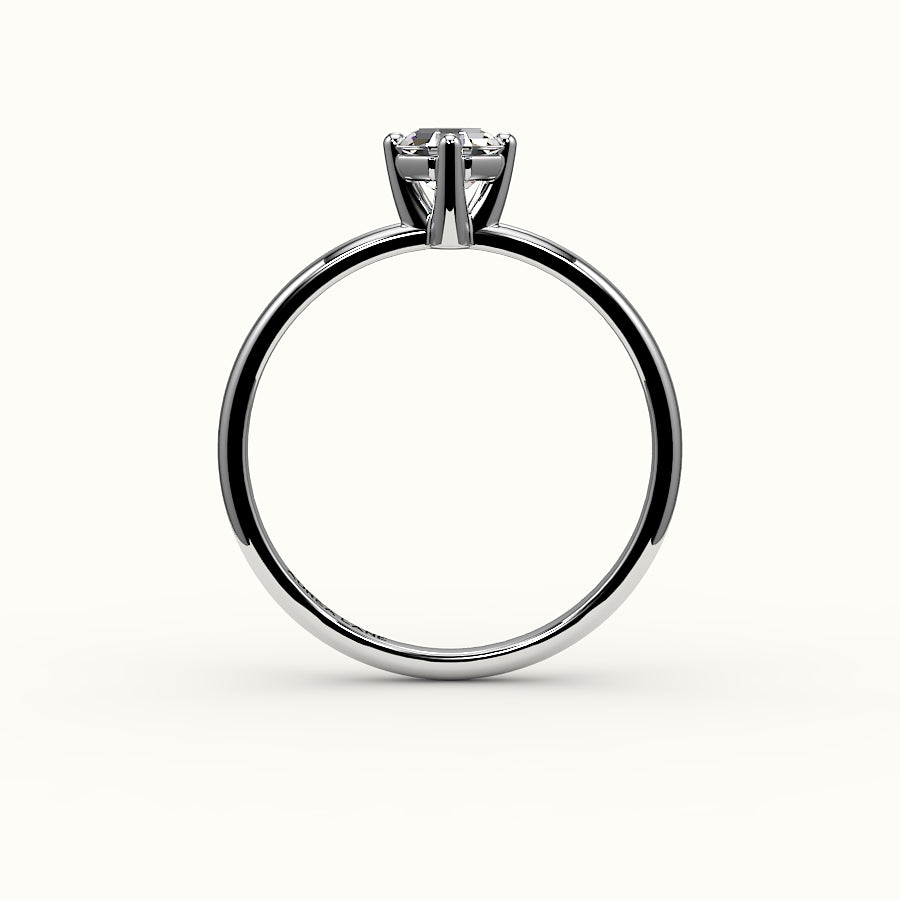 Anillo solitario con corte octogonal y brújula