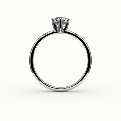 Anillo solitario con corte octogonal y brújula