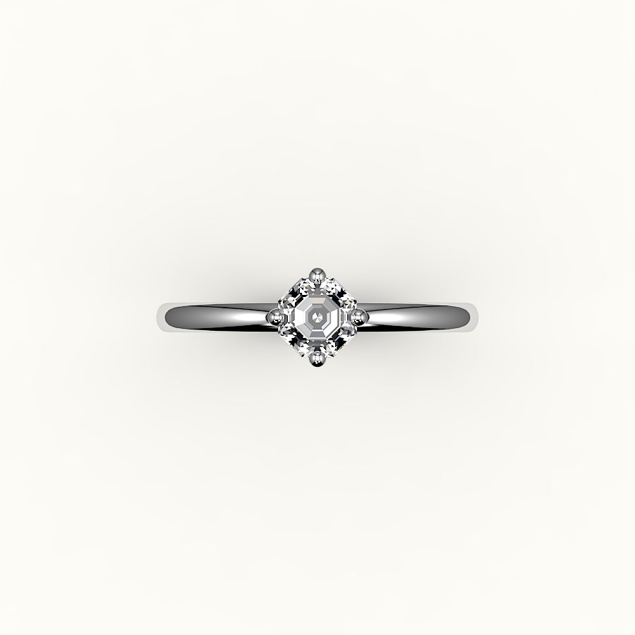 Anillo solitario con corte octogonal y brújula