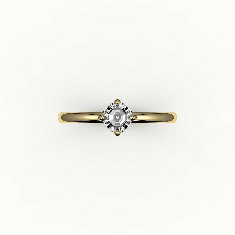 Anillo solitario con corte octogonal y brújula