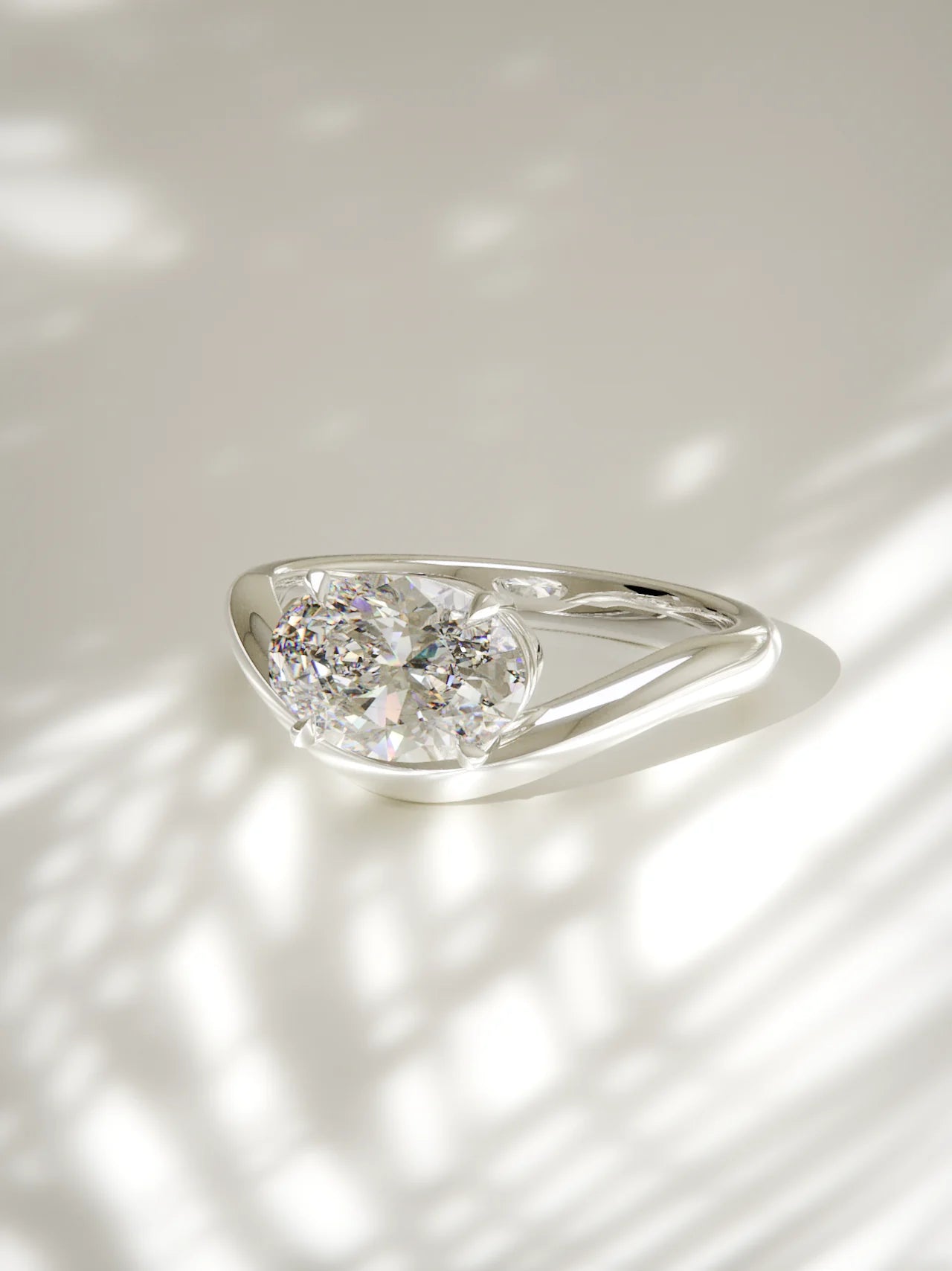 The Arco | Solitario oval Este-Oeste