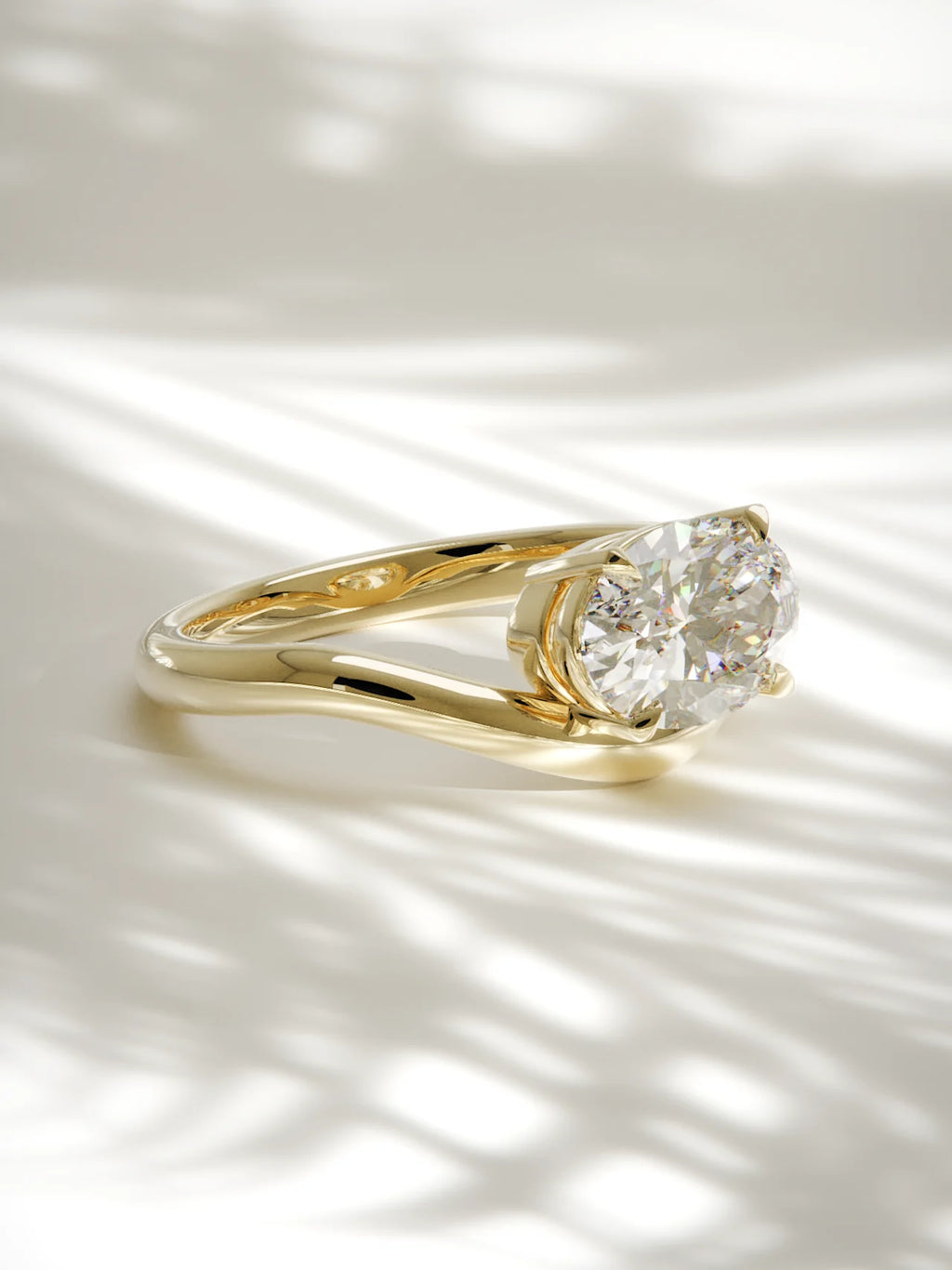 The Arco | East West Oval Solitaire