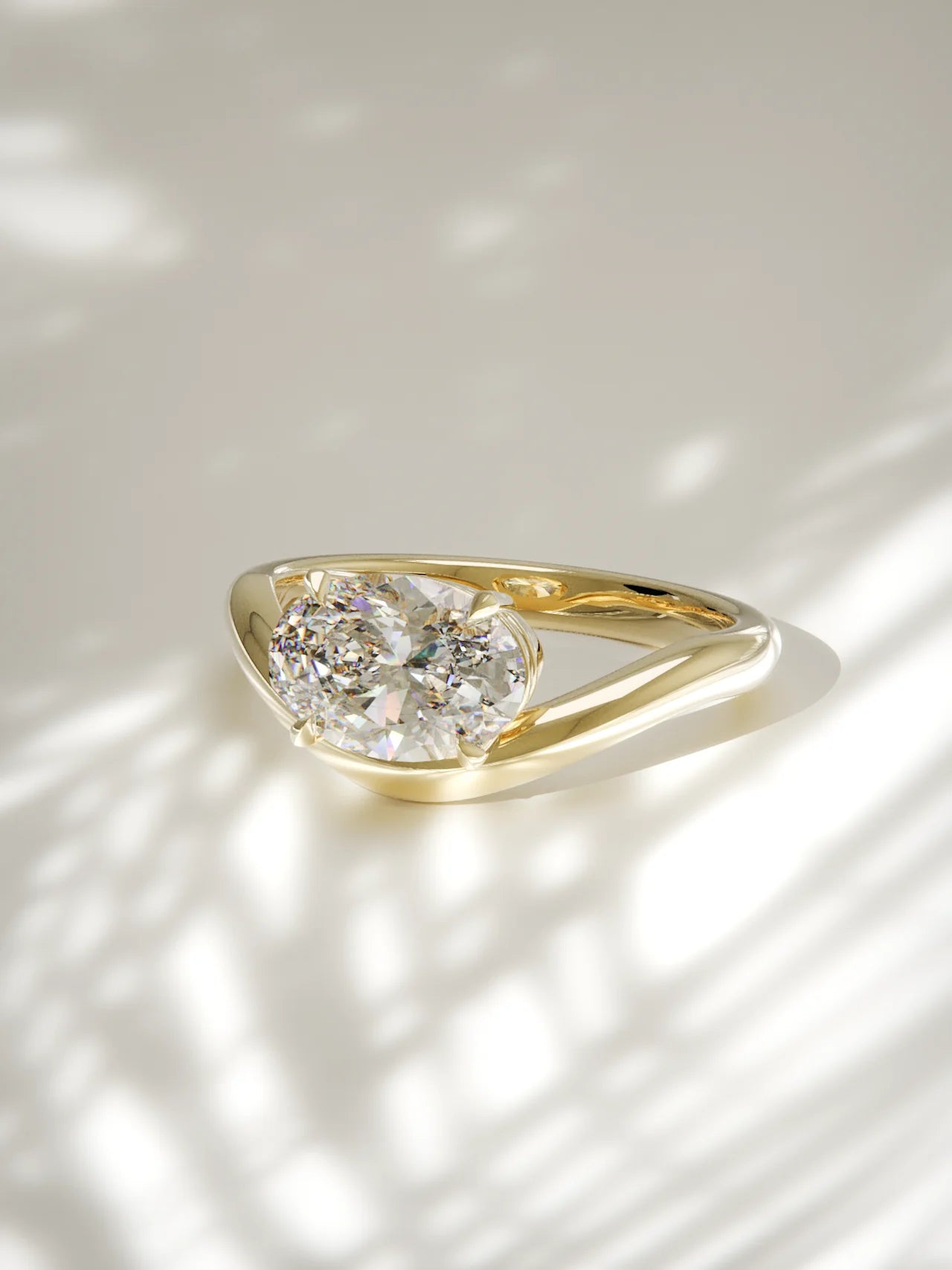 The Arco | Solitario oval Este-Oeste