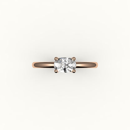 Anillo solitario con engaste de cojín alargado este-oeste