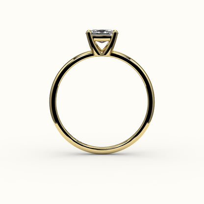 Anillo solitario con engaste de cojín alargado este-oeste