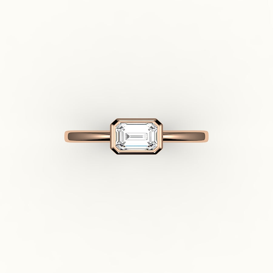 Engaste de anillo con corte esmeralda este-oeste