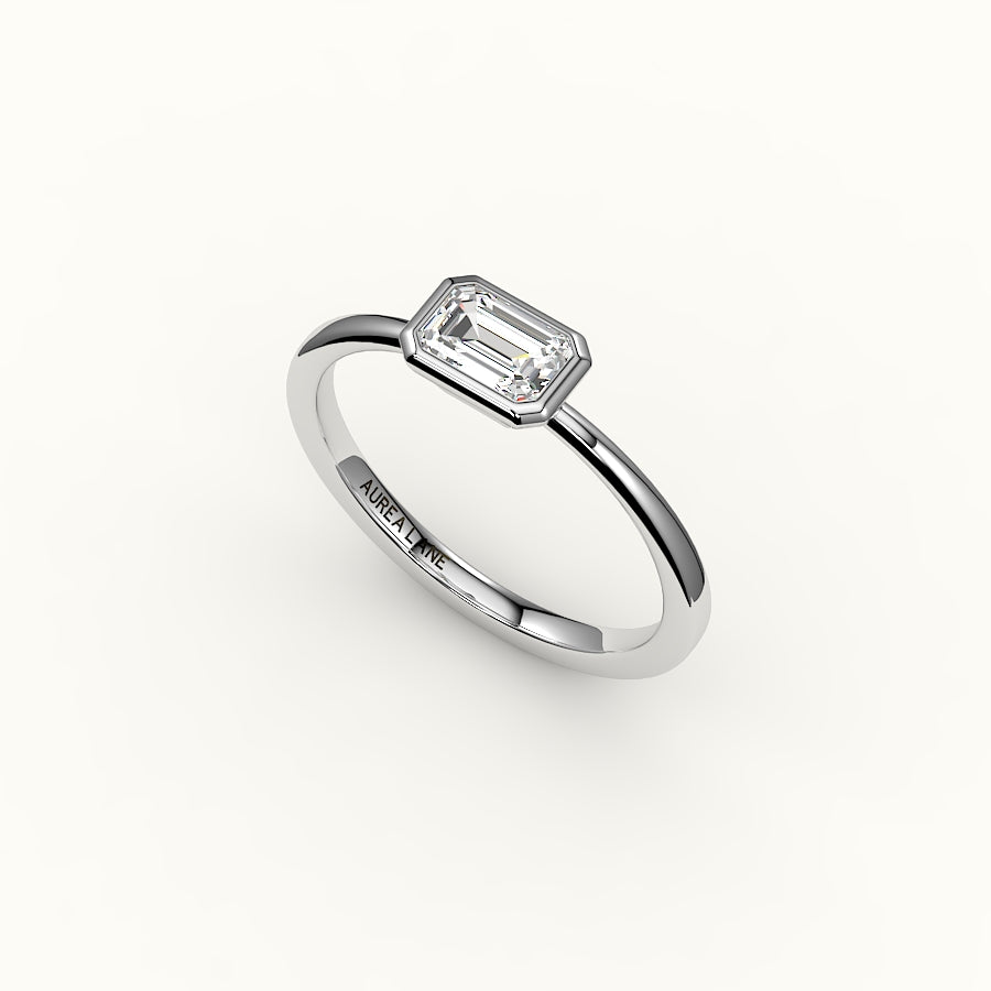 Engaste de anillo con corte esmeralda este-oeste