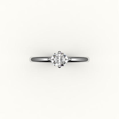 Engaste de anillo solitario con corte hexagonal este-oeste