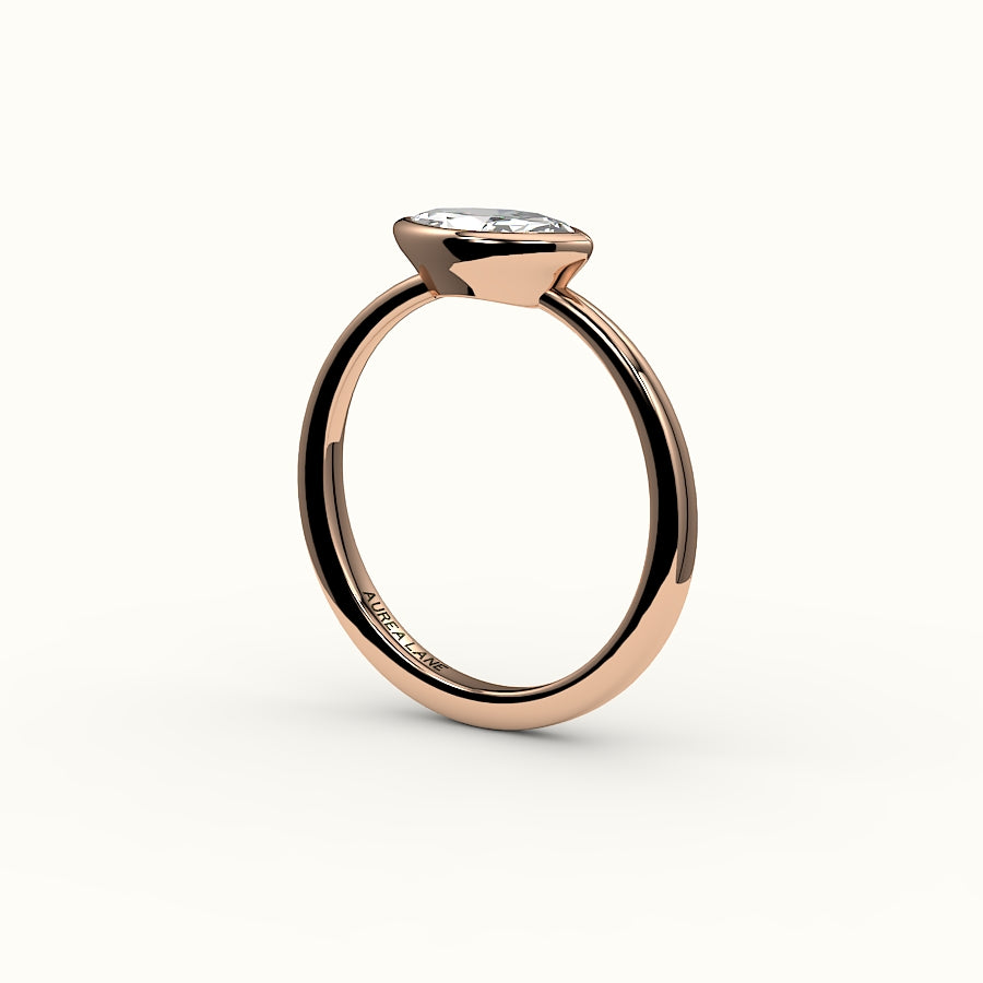 Engaste de anillo con bisel de corte marquesa este-oeste