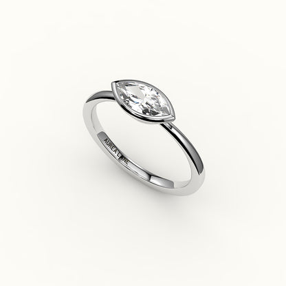 Engaste de anillo con bisel de corte marquesa este-oeste