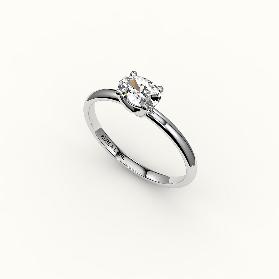 Engaste de anillo solitario ovalado este-oeste