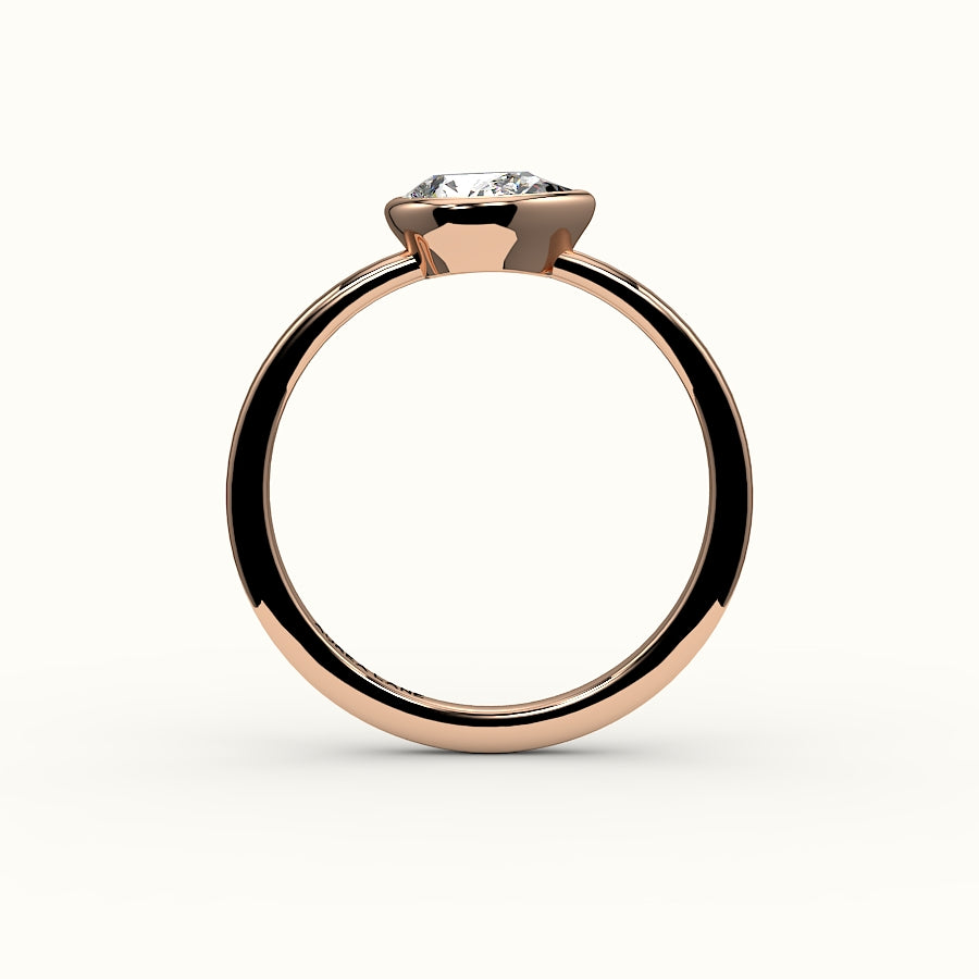 Engaste de anillo con bisel de corte de pera este-oeste