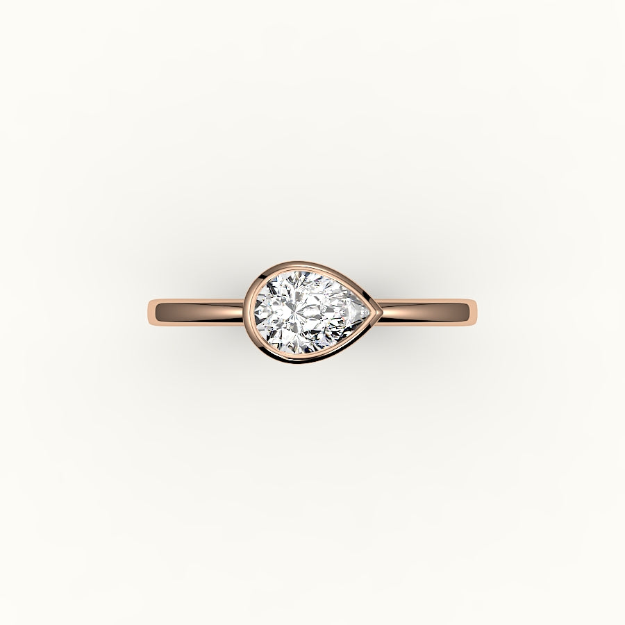 Engaste de anillo con bisel de corte de pera este-oeste