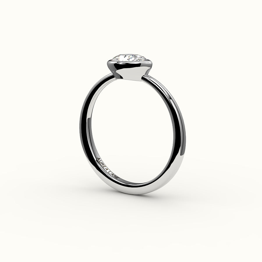 East-West Pear Cut Bezel Ring Setting