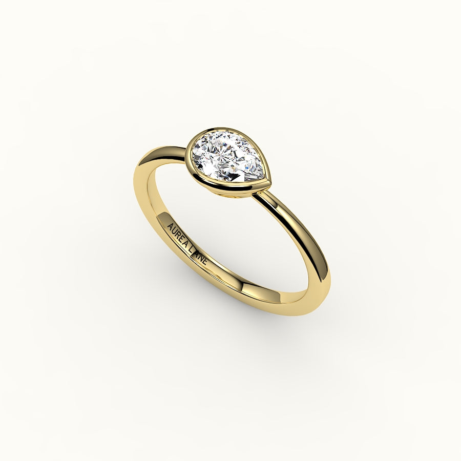 Engaste de anillo con bisel de corte de pera este-oeste