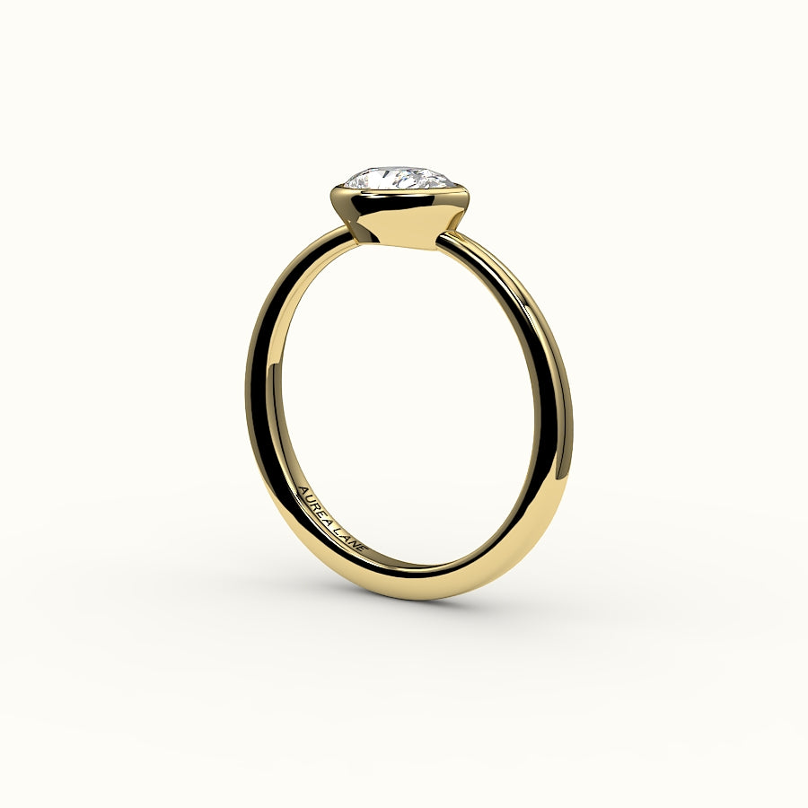Engaste de anillo con bisel de corte de pera este-oeste