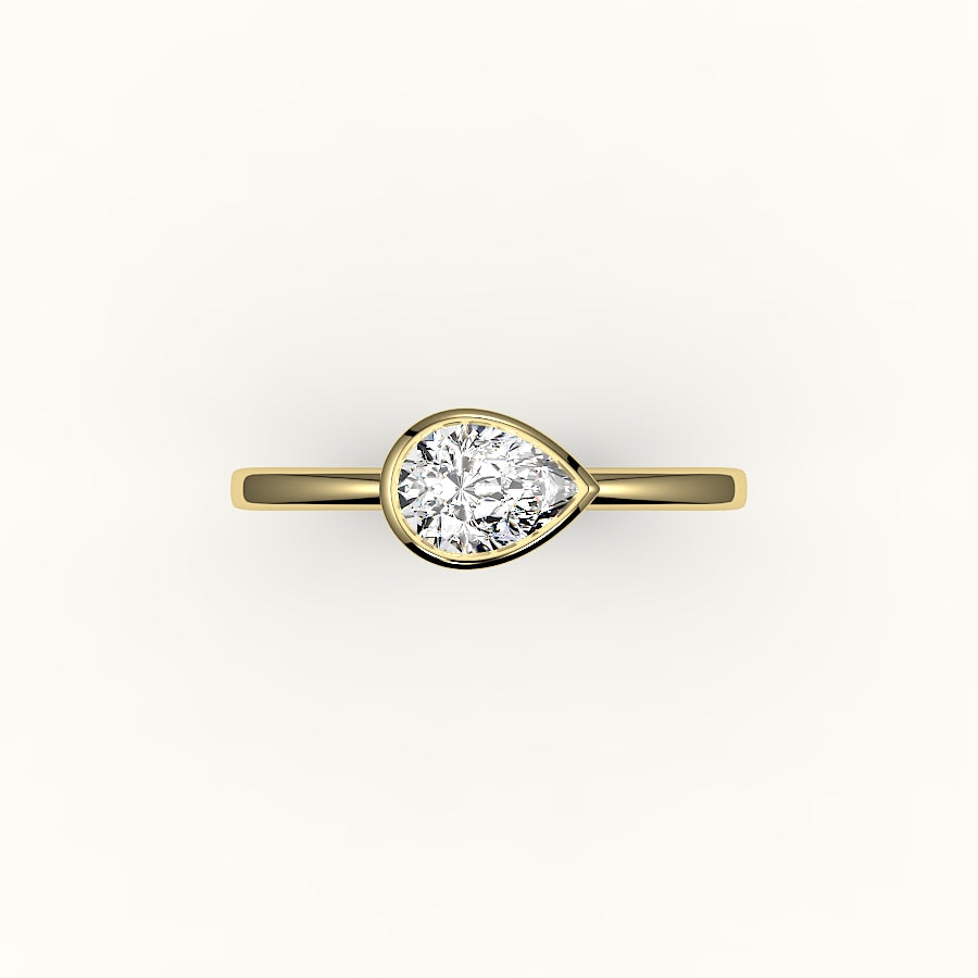 Engaste de anillo con bisel de corte de pera este-oeste