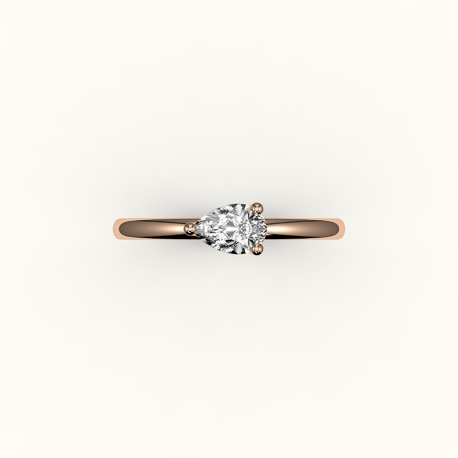 Engaste de anillo solitario de corte pera este-oeste