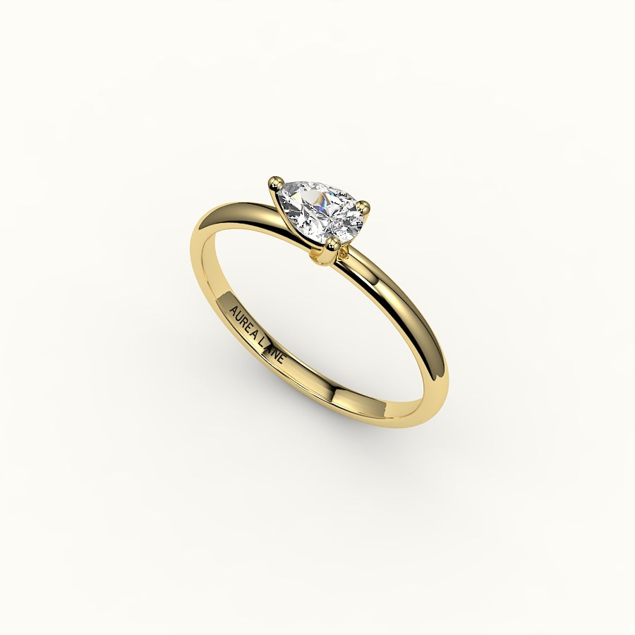 Engaste de anillo solitario de corte pera este-oeste