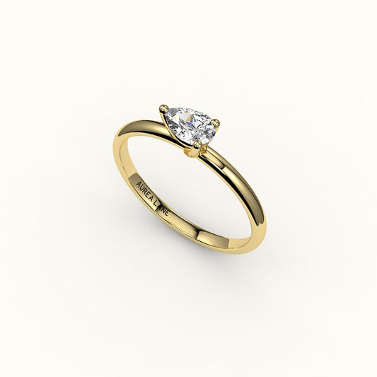 Engaste de anillo solitario de corte pera este-oeste