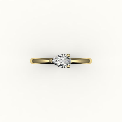 Engaste de anillo solitario de corte pera este-oeste