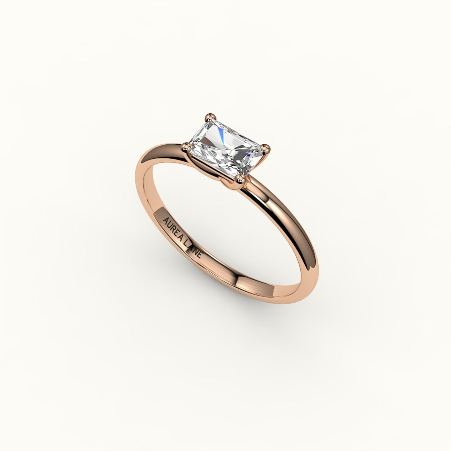 Engaste de anillo solitario de corte radiante este-oeste