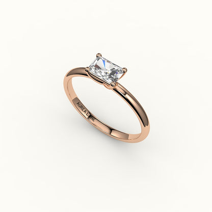 Engaste de anillo solitario de corte radiante este-oeste