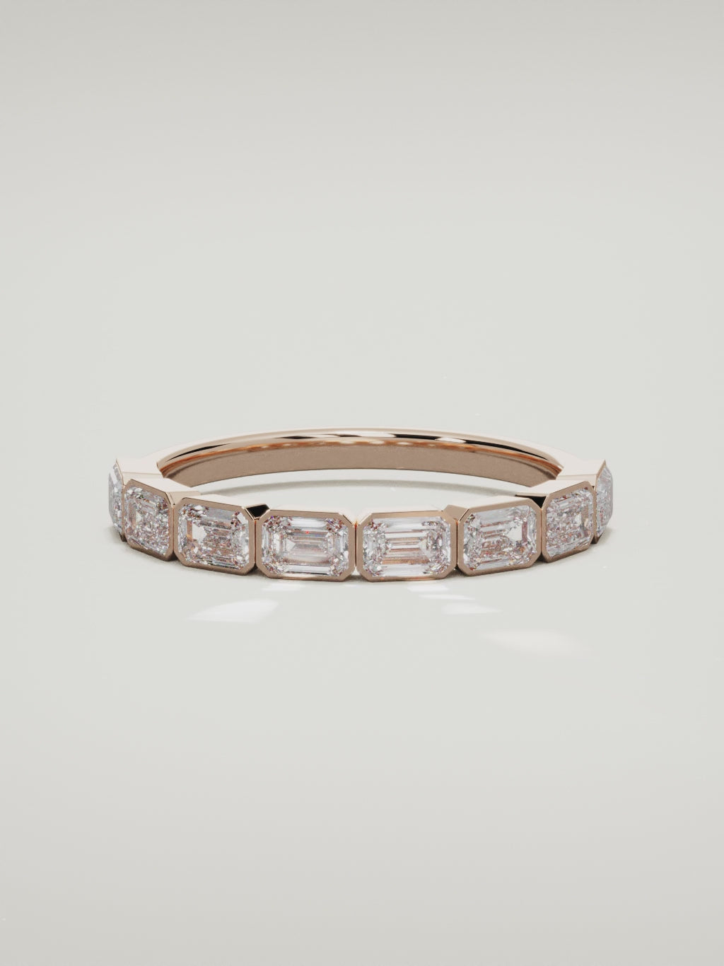 The Cristal east-west bezel emerald-cut band in 14K rose gold, 360 turntable video
