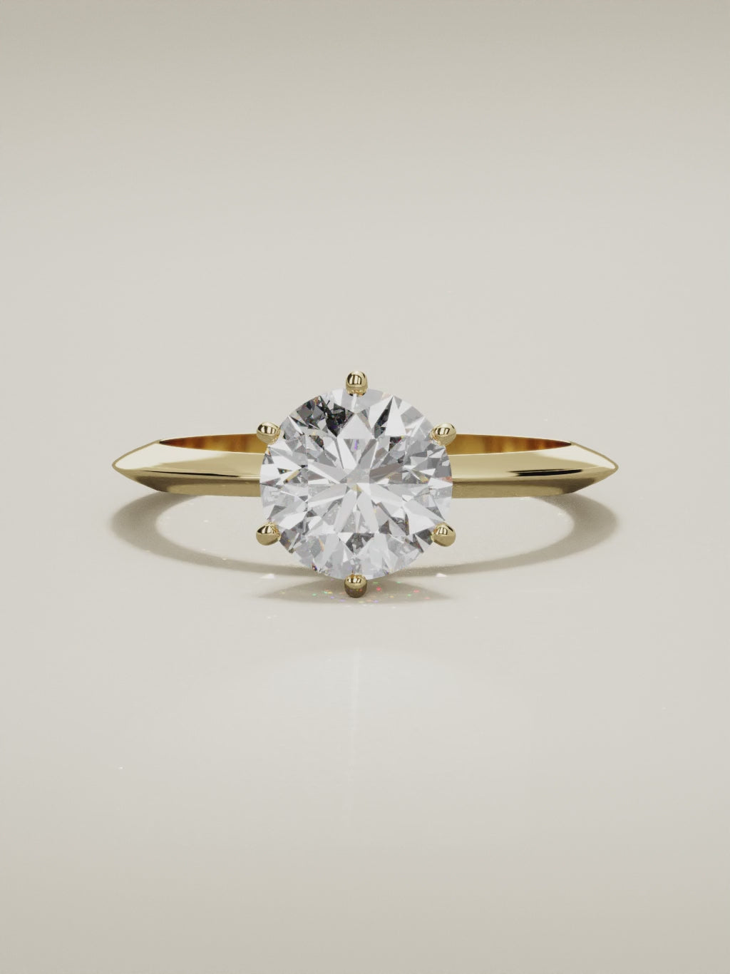 The Prisma round lab-grown diamond solitaire in 14K yellow gold, 360 turntable video