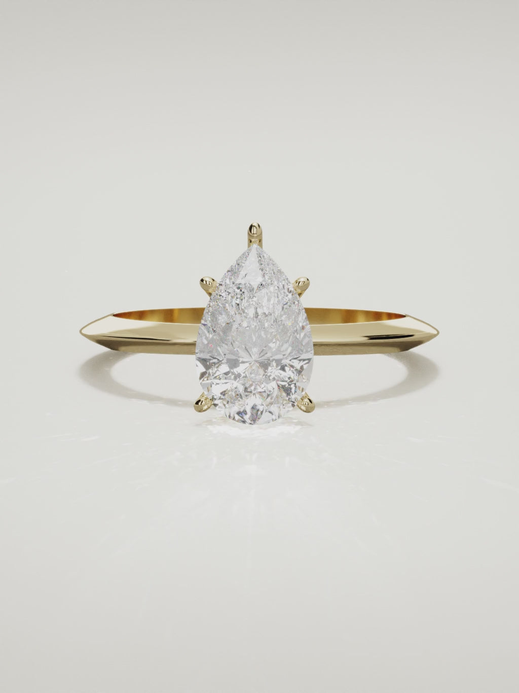 The Prisma pear-shaped lab-grown diamond solitaire in 14K yellow gold, 360 turntable video
