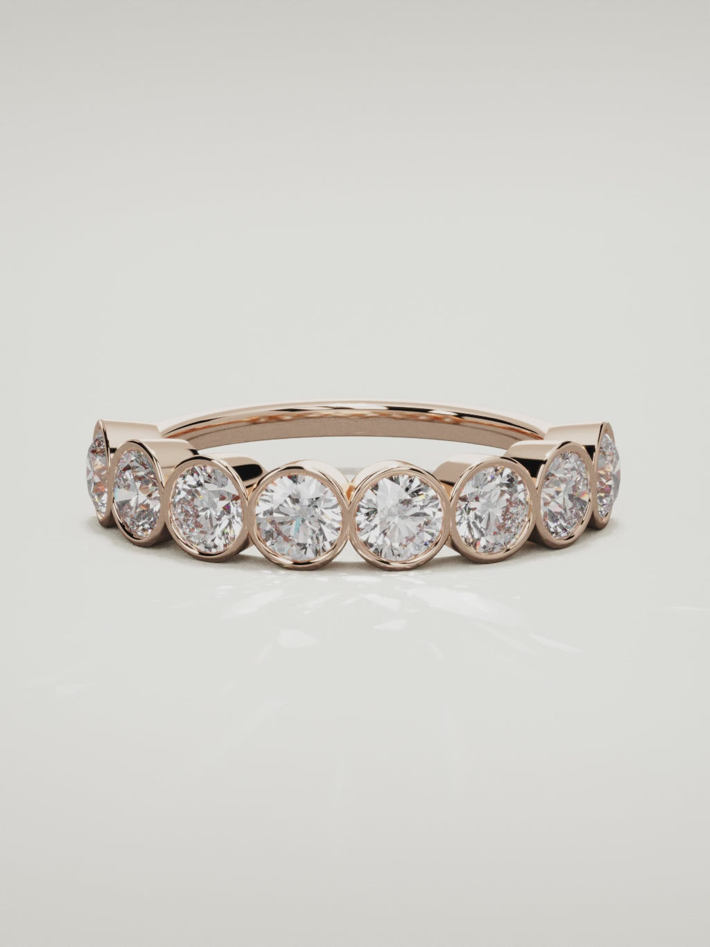 The Lumen large bezel bubble half eternity band in 14K rose gold, 360 turntable video