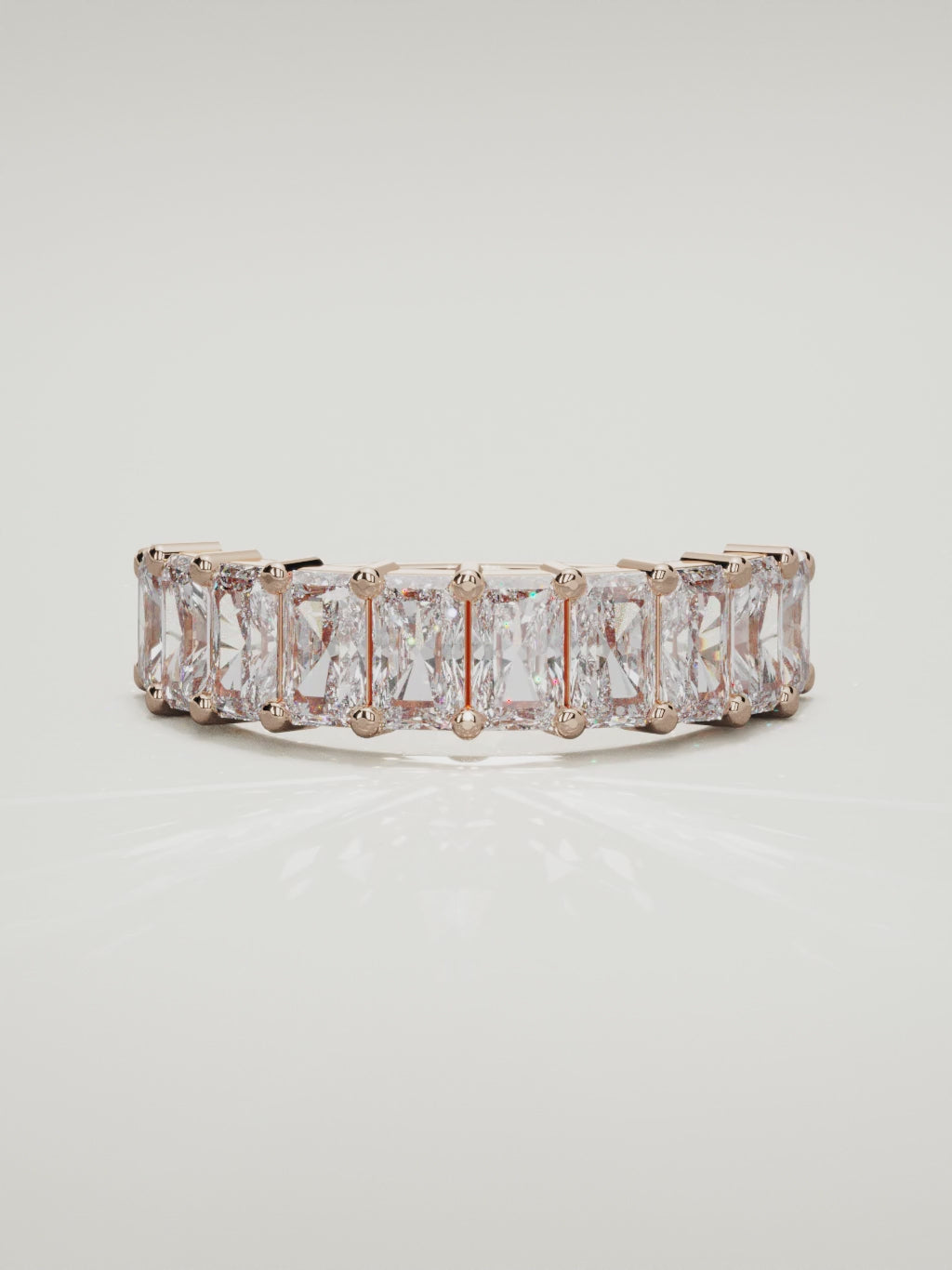 The Astra large prong radiant-cut half eternity band in 14K rose gold, 360 turntable video