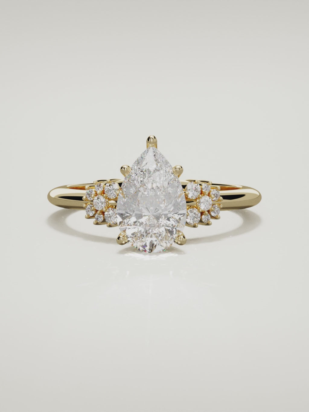 The Flora pear-shaped lab-grown diamond solitaire in 14K yellow gold, 360 turntable video