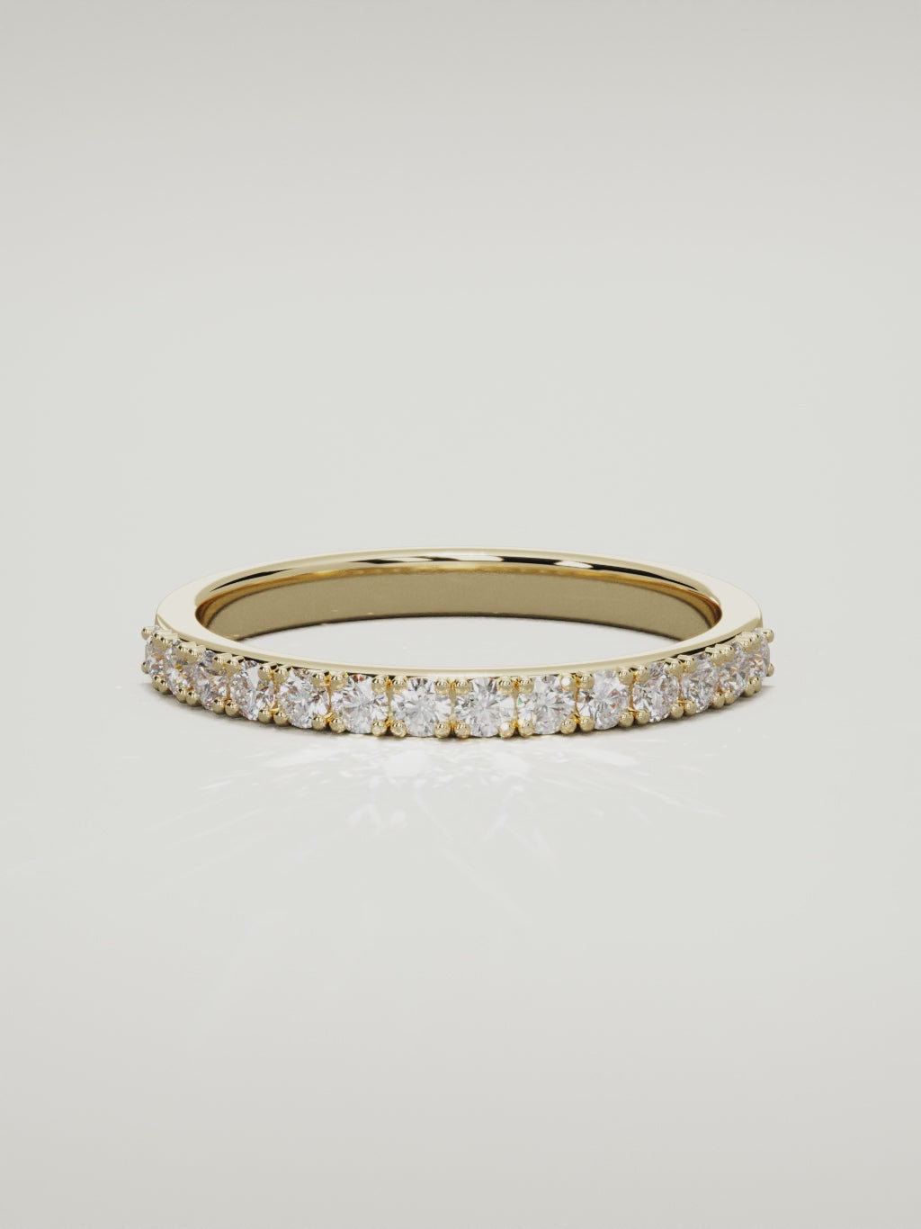 The Sutil low-profile petite half eternity band in 14K yellow gold, 360 turntable video