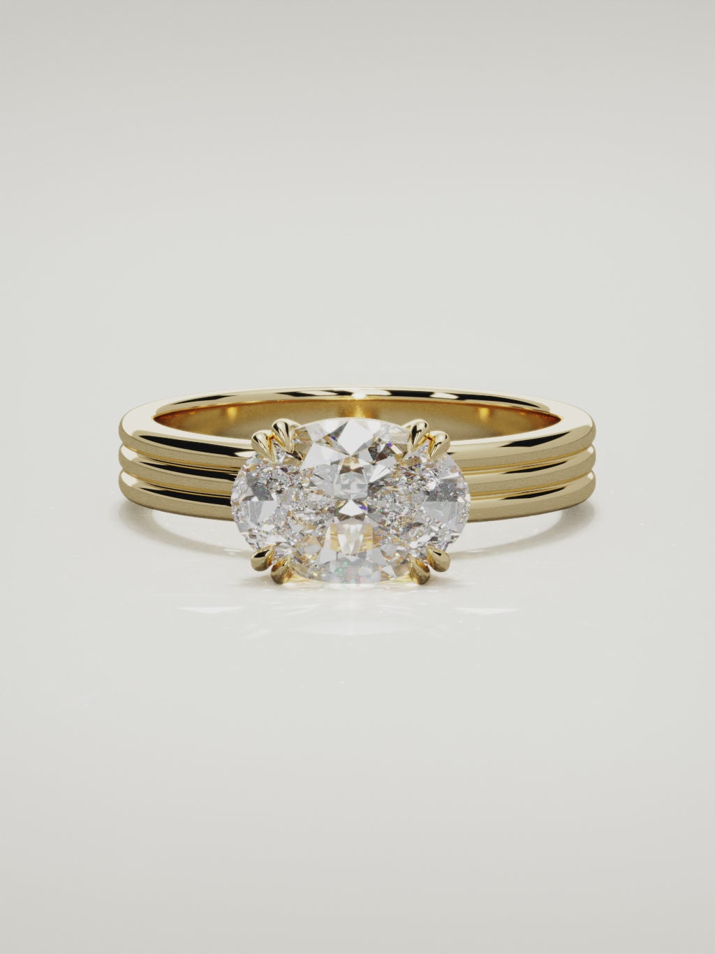The Lira east-west oval lab-grown diamond solitaire in 14K yellow gold, 360 turntable video