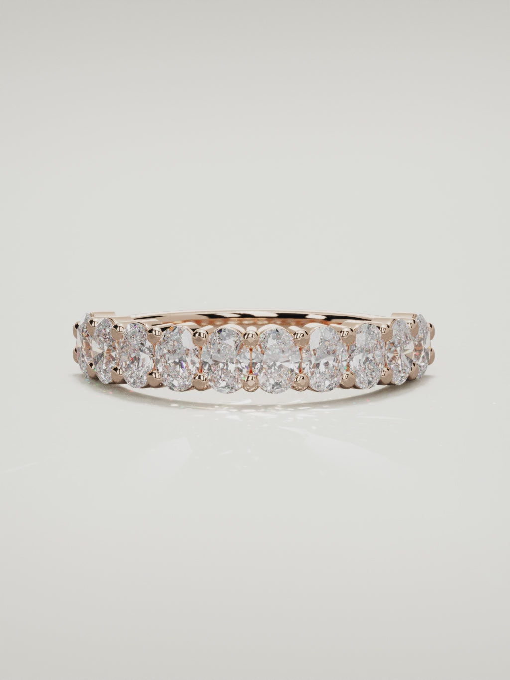 The Musa north-south oval half eternity band in 14K rose gold, 360 turntable video