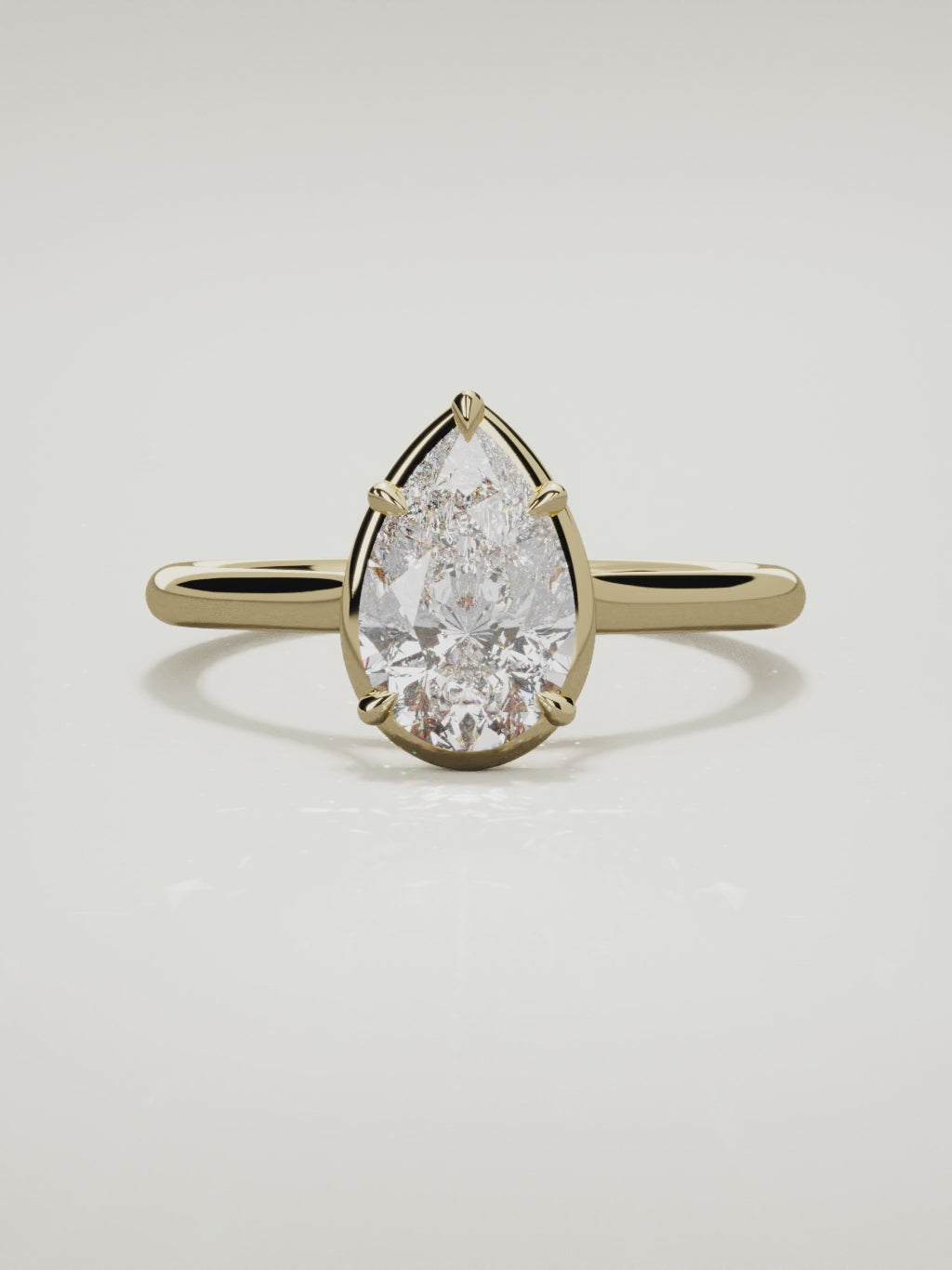 The Orbe pear-shaped lab-grown diamond solitaire in 14K yellow gold, 360 turntable video