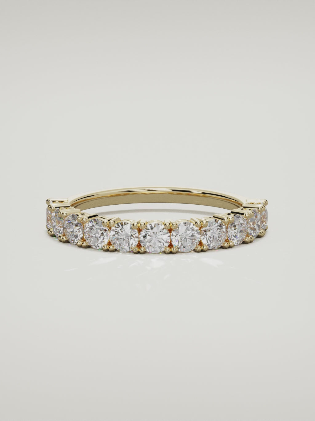 The Gloria open-prong half eternity band in 14K yellow gold, 360 turntable video