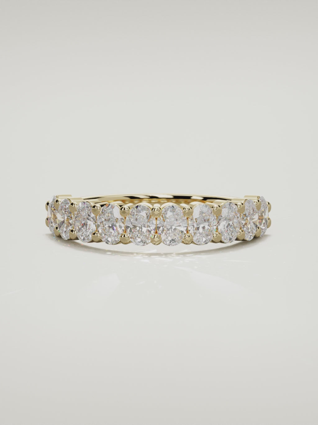 The Musa north-south oval half eternity band in 14K yellow gold, 360 turntable video