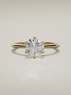 The Iris round lab-grown diamond solitaire in 14K yellow gold, 360 turntable video