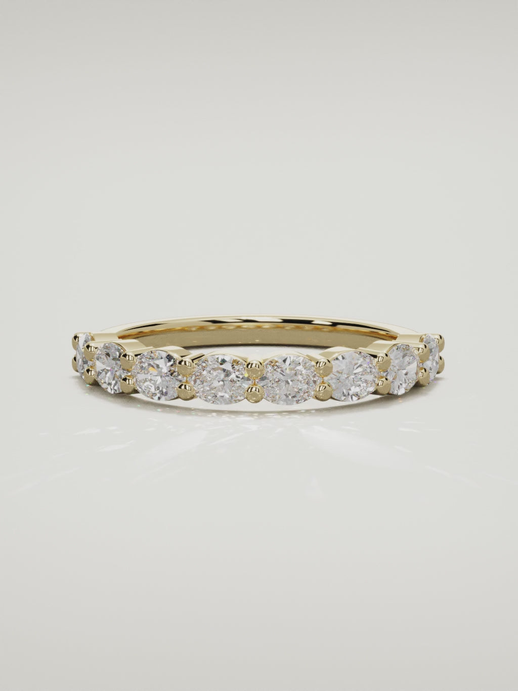 The Dama east-west oval half eternity band in 14K yellow gold, 360 turntable video