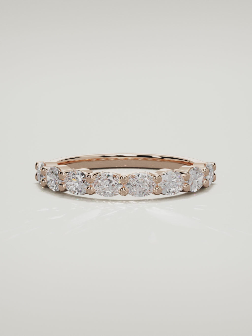 The Dama east-west oval half eternity band in 14K rose gold, 360 turntable video
