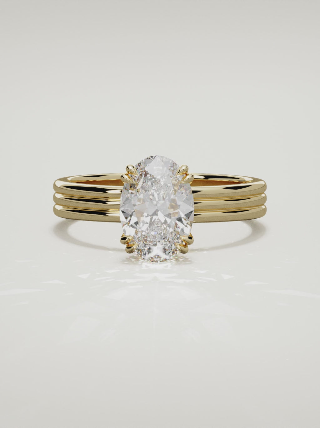 The Lira oval lab-grown diamond solitaire in 14K yellow gold, 360 turntable video
