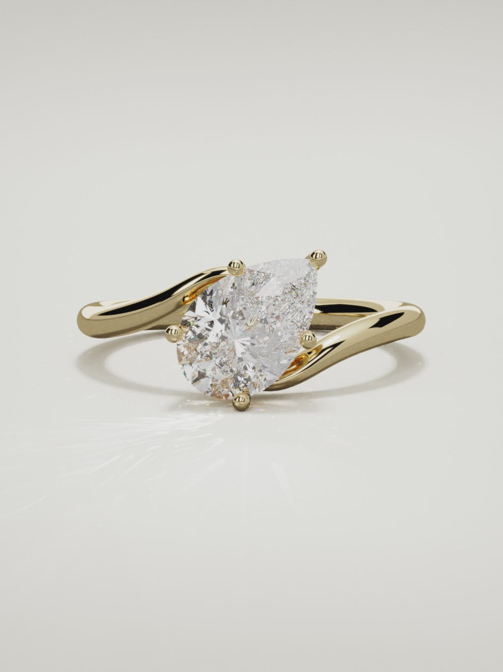 The Ola east-west pear-shaped lab-grown diamond solitaire in 14K yellow gold, 360 turntable video