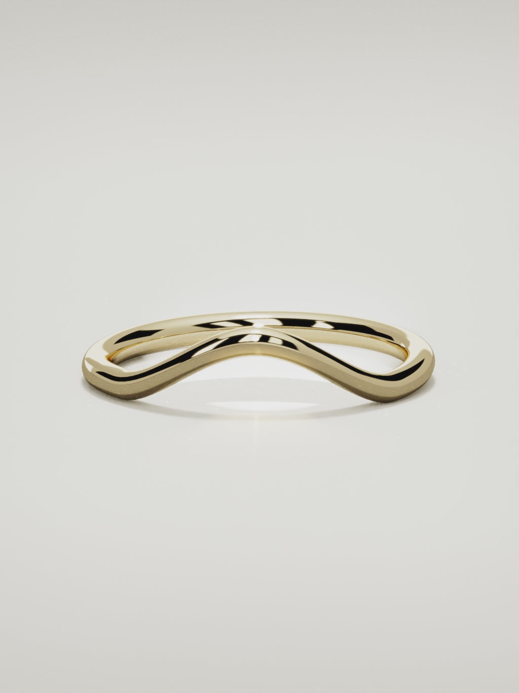 The Rima rounded contour wedding band in 14K yellow gold, 360 turntable video