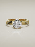 The Lira round lab-grown diamond solitaire in 14K yellow gold, 360 turntable video