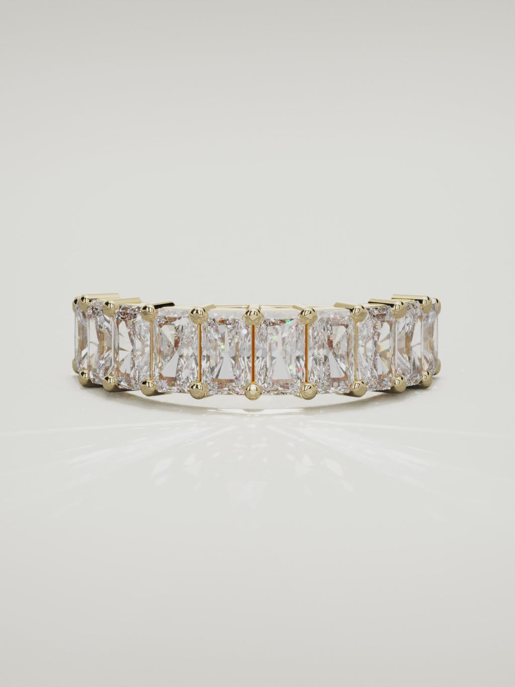 The Astra large prong radiant-cut half eternity band in 14K yellow gold, 360 turntable video