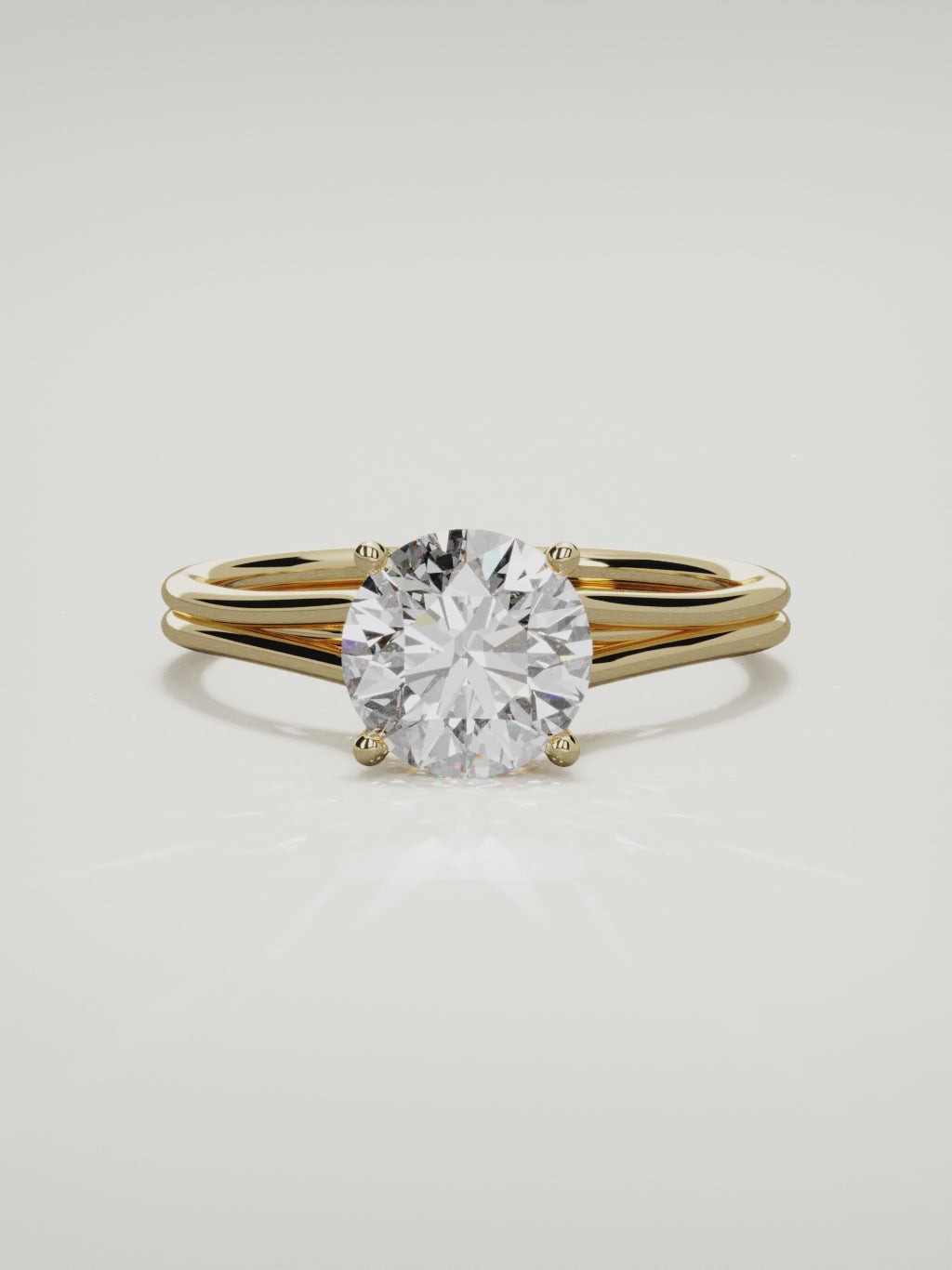 The Duo round lab-grown diamond solitaire in 14K yellow gold, 360 turntable video