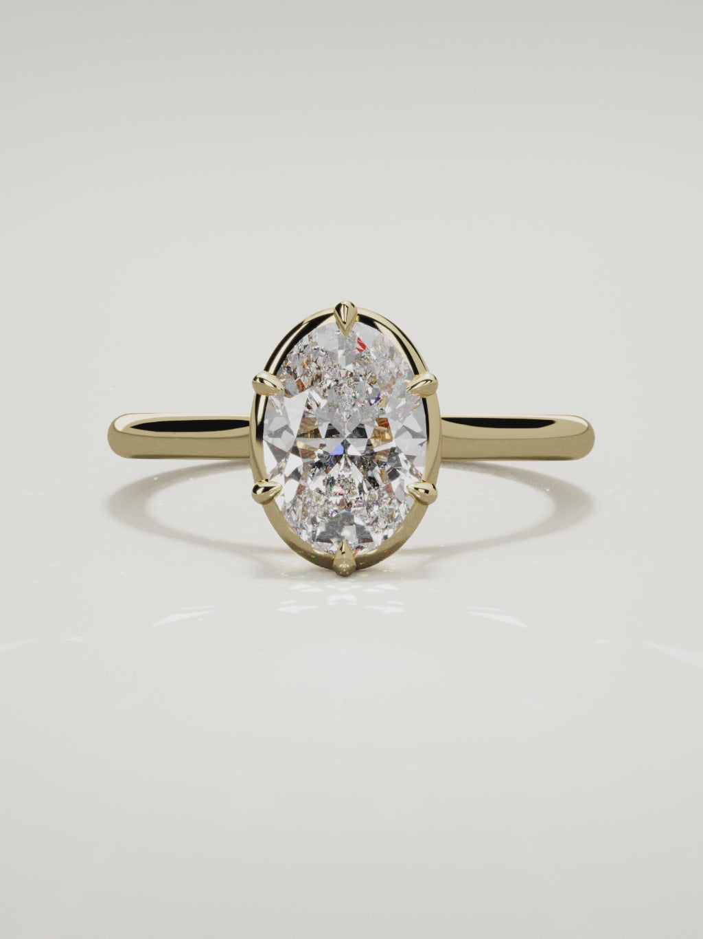 The Orbe oval lab-grown diamond solitaire in 14K yellow gold, 360 turntable video